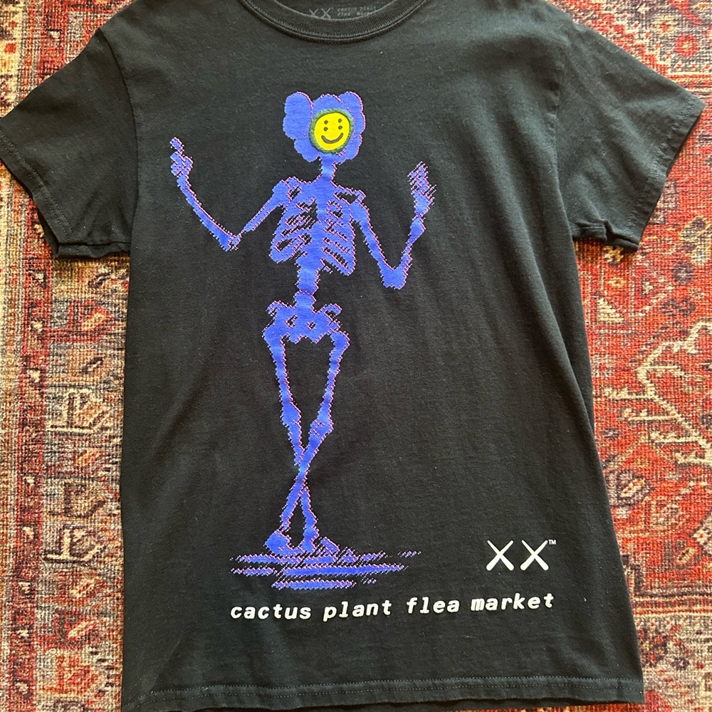CACTUS PLANT FLEA MARKET X KAWS SHIRT